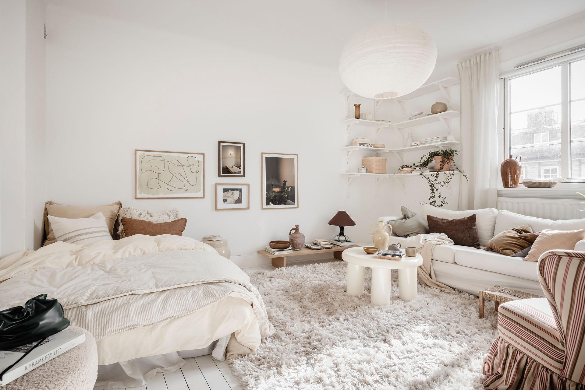 salon et coin chambre décoration scandinave blanche studio 27m2