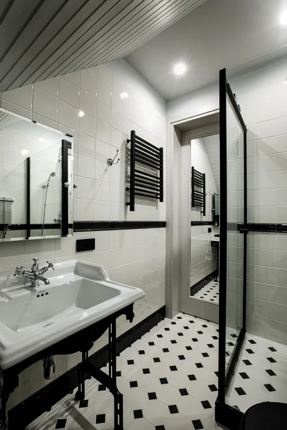 salle de bain blanche et noire sol cabochons