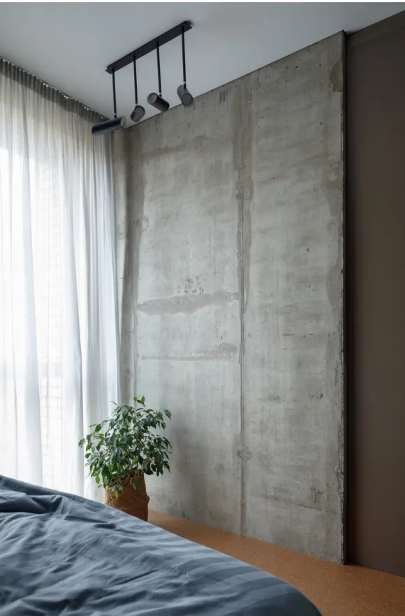 chambre mur béton studio 41m2 transformé en deux-pièces décoration contemporaine