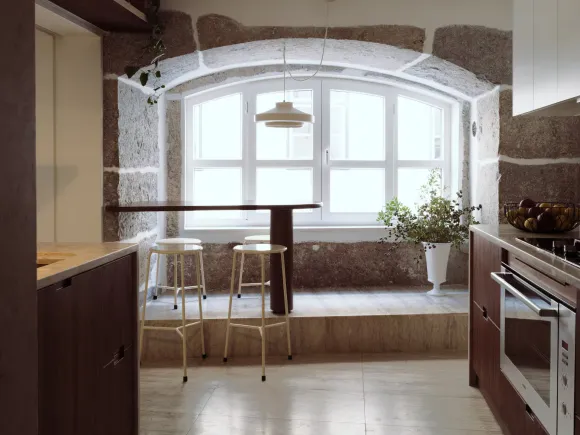 walnut kitchen with arched stoned windows 