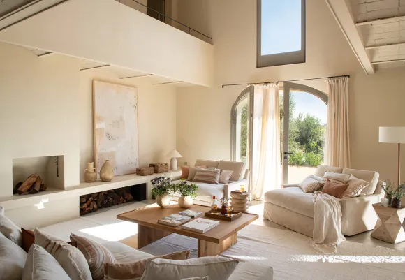 double height living room Casa Carolina house in Emporda Spain with pool rustic chic decor