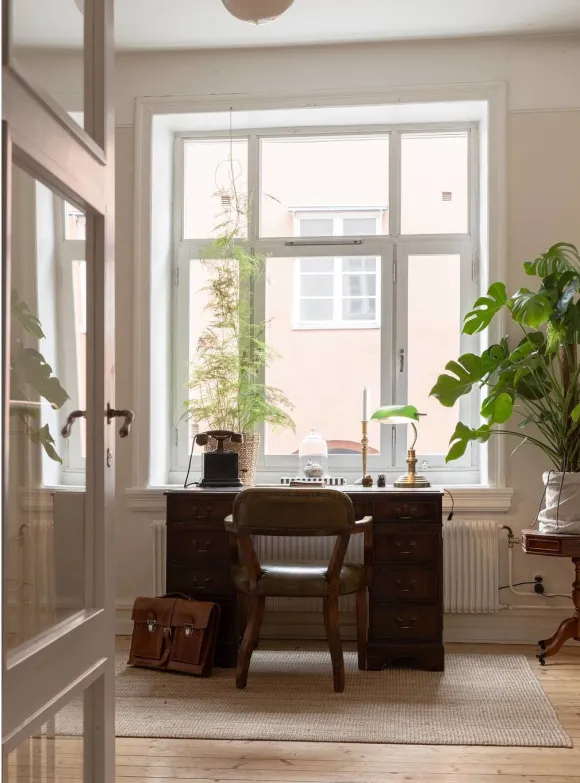 home office with beige walls 1909 duplex apartment in Malmö classic chic and scandinavian decor