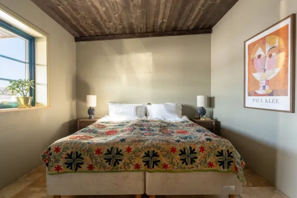 bedroom with wooden ceiling boho decor