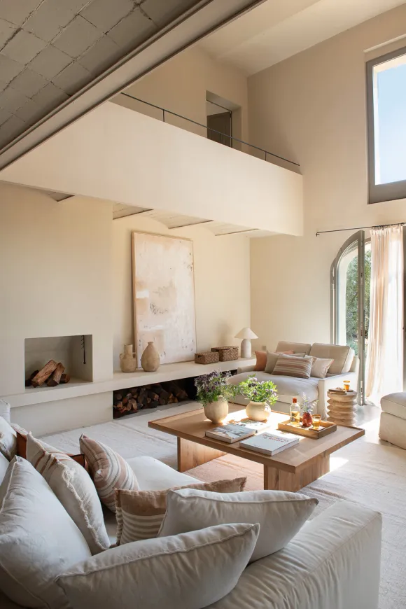 double height living room Casa Carolina house in Emporda Spain with pool rustic chic decor